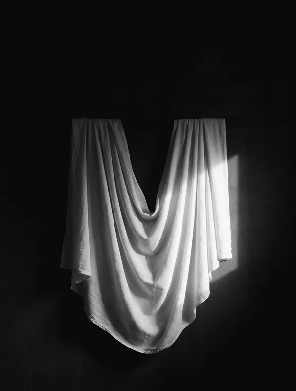 Folded White Drapery